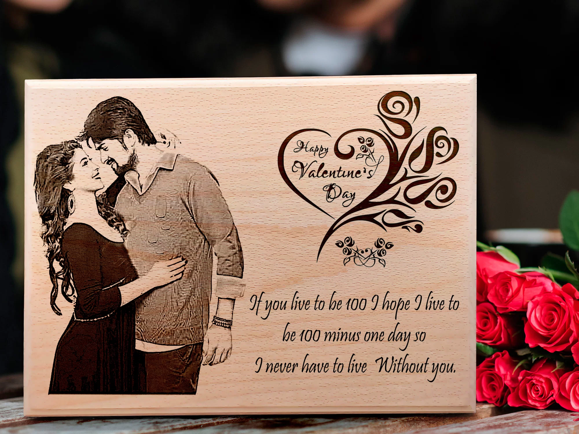 Wood guitar wall hanger engraved with musical notes and performer’s name